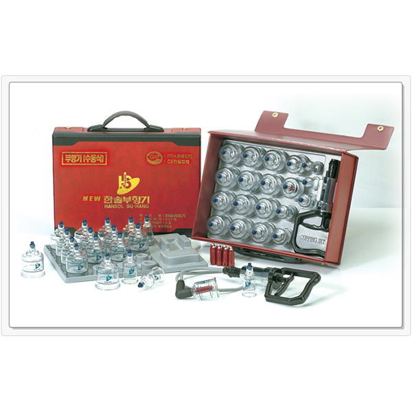 A cupping set displayed with various sized clear cups, a hand pump, and trigger point inserts, packaged in a red carry case.